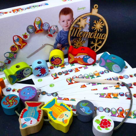 Дерев'яна іграшка Шнурівка Рибки Cubika (Левеня) 13647