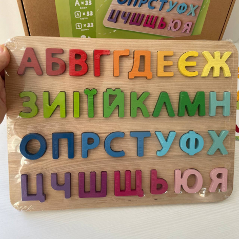 Дерев'яна гра-сортер з картками (рамка-вкладиш) Українська абетка Logosvit