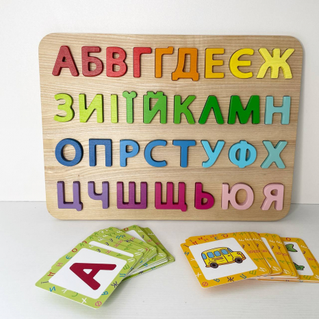 Дерев'яна гра-сортер з картками (рамка-вкладиш) Українська абетка Logosvit