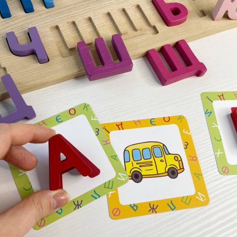 Дерев'яна гра-сортер з картками (рамка-вкладиш) Українська абетка Logosvit