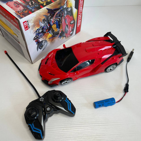 Дитяча іграшка машина-трансформер на р/к (акум., світлові ефекти) 27-6KX