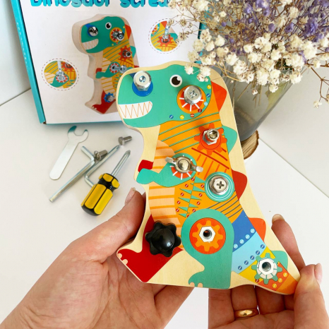 Дерев'яна дошка для розвитку моторики Динозавр C 35581: викрутка, шестигранні ключі, гайковий ключ