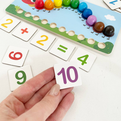 Дерев'яна гра - сортер з кульками та пінцтом математична Гусениця C 65766