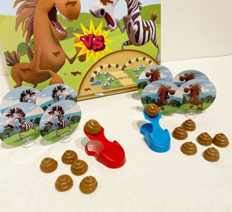 Дитяча розважальна гра на влучність з какашками, зебри проти коней 777-119