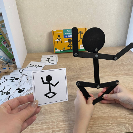 Розвиваюча дерев'яна головоломка Чоловічок