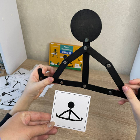 Розвиваюча дерев'яна головоломка Чоловічок