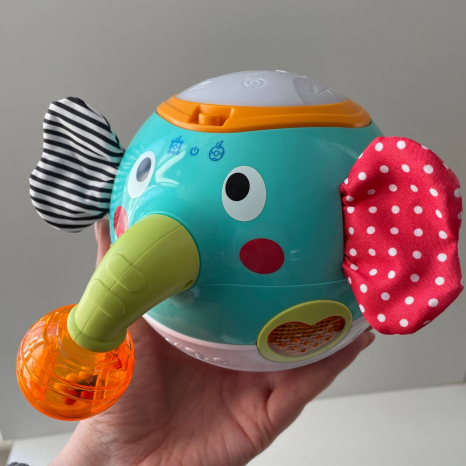 Брязкальце-неваляшка Слоник: світло, музика, звуки, елементи-шурхотуни, хоботок обертається на 360°, геометричні фігури