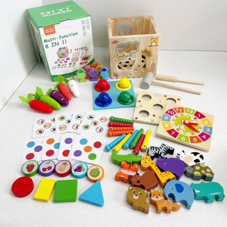 Дерев'яний бізікуб: куб - сортер 8 в 1 (стукалка, магнітна риболовля, моркви, тварини) C 15048