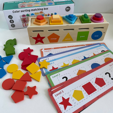 Дерев'яна іграшка Комодик для сортування кольори та геометричні фігури