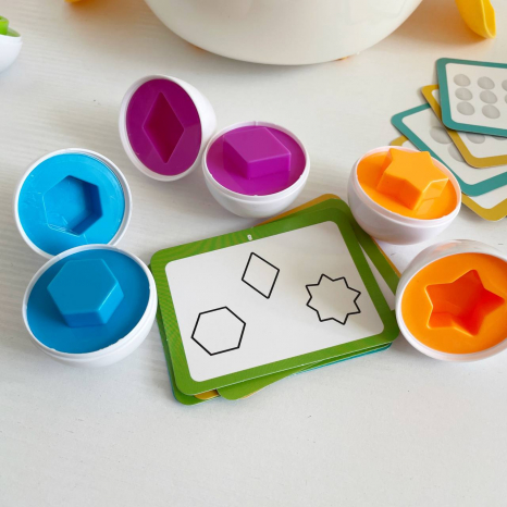 Розвиваюча гра Курочка з яйцями "Вчимо цифри,фігури та рахунок"