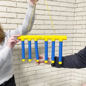 Іграшка для тренування реакції з падаючими палицями