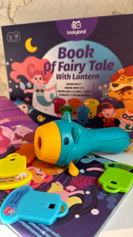 Детский фонарик-проектор со сказками и театром теней TookyLand LT279