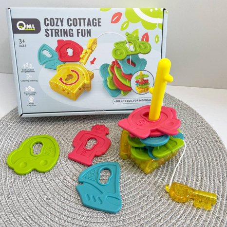 Логічна гра: шнурівка, пірамідка, прорізувач, брязкальце Замочок та ключики M 10 F