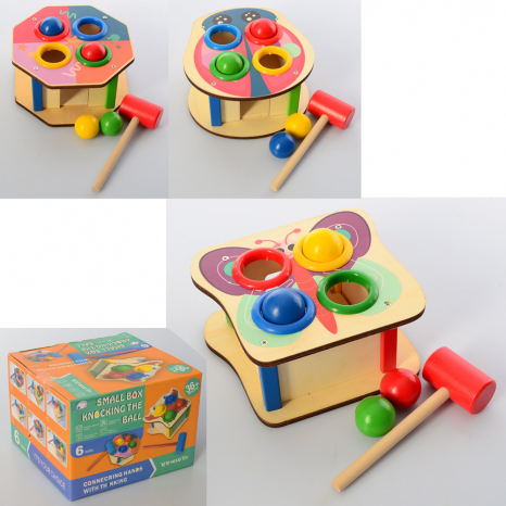 Дерев'яна стукалка з кульками