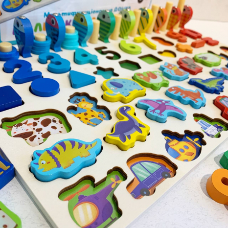 Дерев'яна багатофункціональна дощечка - сортер : цифри, транспорт, тварини, динозаври, фігури, риболовля MD 1948