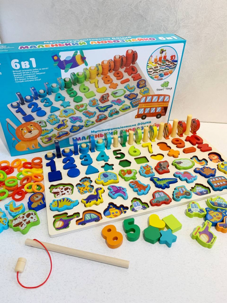 Дерев'яна багатофункціональна дощечка - сортер : цифри, транспорт, тварини, динозаври, фігури, риболовля MD 1948