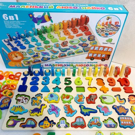 Дерев'яна багатофункціональна дощечка - сортер : цифри, транспорт, тварини, динозаври, фігури, риболовля MD 1948
