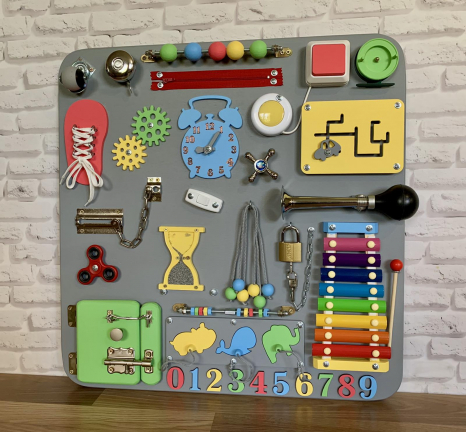 Дерев'яний розвиваючий бізіборд 60х60