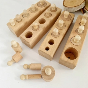 Дерев'яна іграшка  циліндри більше - менше (нефарбовані, нелаковані) Монтессорі
