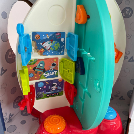 Логічна іграшка - бізіцентр Ракета: музика, шестерні, обертові елементи, дверцята,  RJ 6828