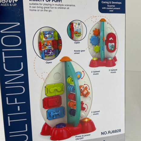 Логічна іграшка - бізіцентр Ракета: музика, шестерні, обертові елементи, дверцята,  RJ 6828