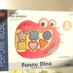 УЦІНКА!!! Музична розвиваюча гра для малят динозавр-сортер, фігури-брязкальця