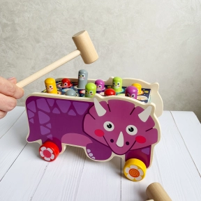 Дерев'яна стукалка - каталка Динозавр