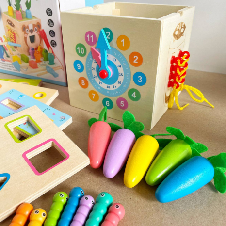 Дерев'яна іграшка багатофункцінальний куб Монтессорі 8 в 1