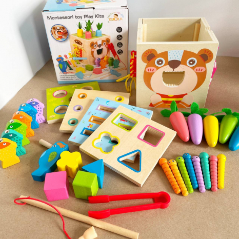 Дерев'яна іграшка багатофункцінальний куб Монтессорі 8 в 1