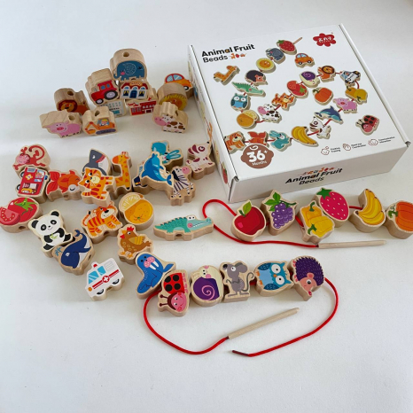Дерев'яна шнурівка - намисто 42 фігурки та 4 шнурки з дерев'яною голочкою (тварини, фрукти, транспорт, цифри, букви) С 74473